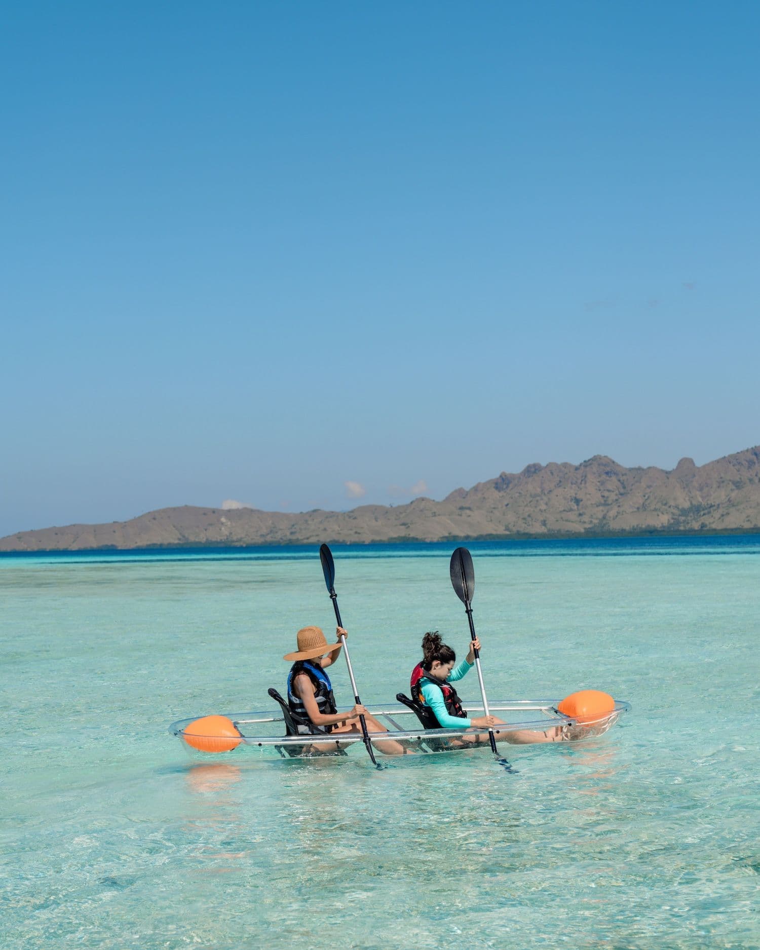 two people play canoe in the beautiful place